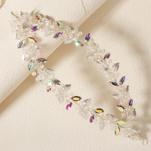 Detailed handmade double-layer bridal headband with rainbow rhinestones and silver leaves