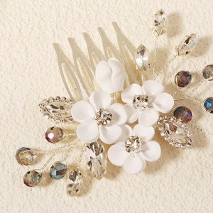 Handmade bridal hair comb with white clay flowers and crystal rhinestones for weddings