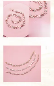 Macro detail of rose gold floral bridal headpiece with crystal leaves and faux pearls