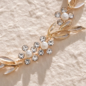 Vintage gold leaf and floral bridal headpiece with elegant pearls and sparkling crystals