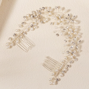 Detail of bridal hair comb with handmade silver wire pearls and floral rhinestones