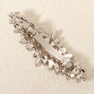 Pince à cheveux feuilles argentées avec cristaux zircon et fermoir à ressort