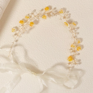 Handmade yellow flower bridal headband with white pearls and organza ribbons for weddings