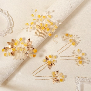 Ensemble d'accessoires cheveux mariée avec fleurs jaunes, feuilles d'or et perles