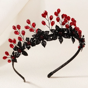 Detail of gothic Halloween headband with black 3D flowers and red crystal water drops