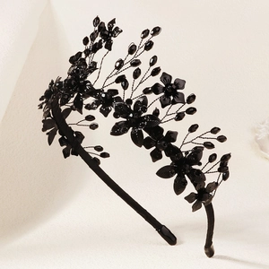 Detailed close-up of a handmade gothic black crystal flower crown for Halloween party decor