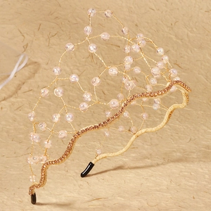 Luxurious handmade crystal bridal headband with pink pearls and gold wire mesh detailing
