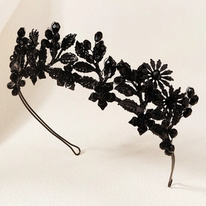 Detail of Gothic black floral crown with dark crystals and vine design for Halloween