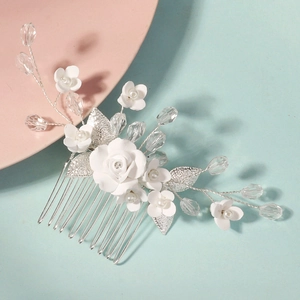 Handmade bridal hair comb with white ceramic flowers, crystal beads and silver leaves
