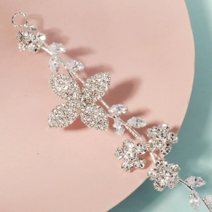 Exquisite silver bridal headband with sparkling rhinestones and zircon floral designs
