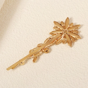 Elegant gold snowflake hair clip accessory for bridal weddings and formal party hairstyles