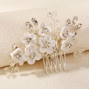 Handmade bridal hair comb with white ceramic flowers, crystals and pearls for wedding