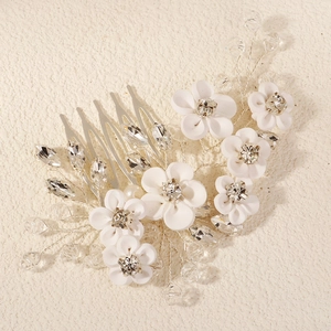 Exquisite bridal hair comb with handmade clay flowers and sparkling crystals on silver wire