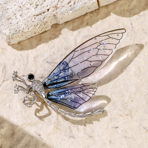 Exquisite dragonfly brooch with purple gradient wings and sparkling cubic zirconia details