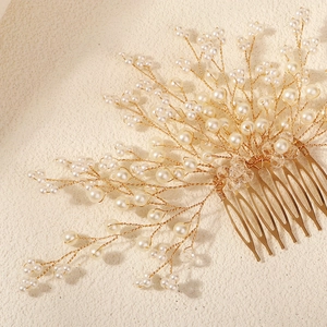 Handmade bridal hair comb with pearls and crystals on a gold wire branch design