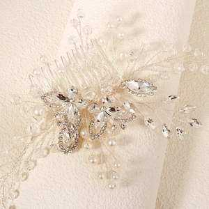 Detail of silver bridal hair comb with crystal beads, marquise rhinestones and pearls