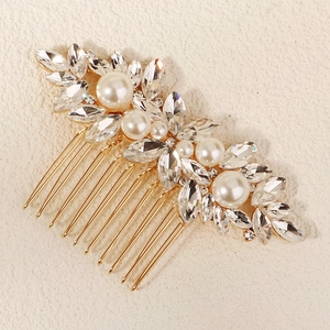 Elegant gold bridal hair comb with pearls and rhinestones for weddings and parties