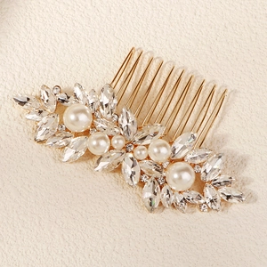Luxurious bridal hair comb with gold floral metal, white pearls and marquise crystals
