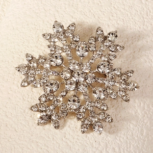 Exquisite snowflake brooch with sparkling crystals and silver-tone alloy base for weddings