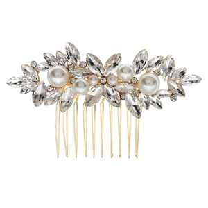 Elegant bridal hair comb with rhinestones and pearls on a gold-plated metal base