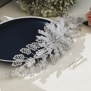 Luxury silver bridal headband with crystal leaves and rhinestones for wedding hair styling