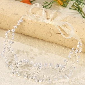 Handmade bridal headband with silver vines, white flowers and organza ribbon bow