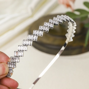 Macro detail of luxury headband with double-row staggered rectangular zircon stones