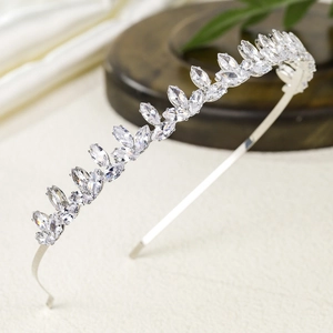 Close-up of elegant marquise-cut zircon crown headband with silver metal finish