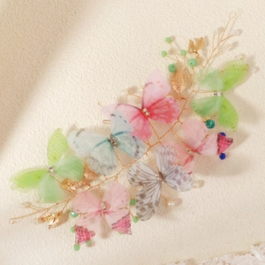 Handmade butterfly hair clips with colorful tulle wings, pearls and gold metal leaves