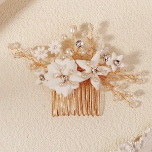 Elegant white clay flower bridal hair comb with pearls and gold wire floral accents