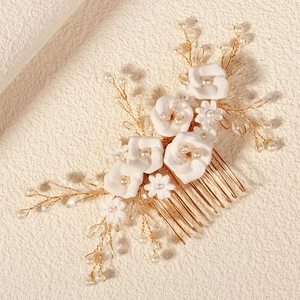 Handmade bridal hair comb with white clay flowers, pearls and gold wire details