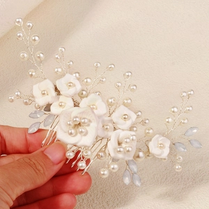 Handmade white clay flower hair comb with pearls and silver wire for bridal hair styling