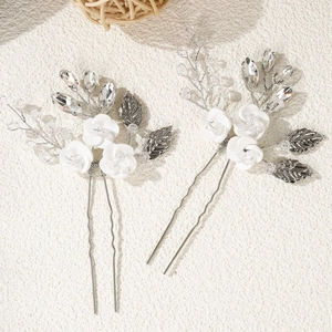 Handmade white ceramic flower hair pins set with silver leaves and crystals for wedding