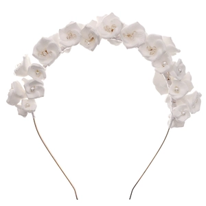 Elegant white floral headband with handmade clay flowers and pearls on a gold metal frame