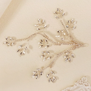 Detailed view of silver bridal hair vine with marquise crystals and metal loops