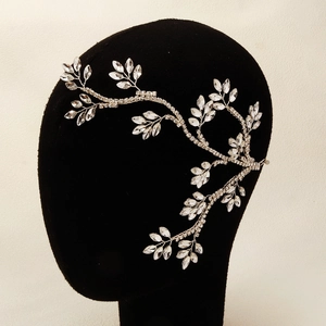 Detailed view of bridal vine headband with silver branch base and teardrop crystals