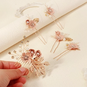Elegantes Haarkamm Set mit goldenen Blättern und rosa Blumen für Brautfrisuren