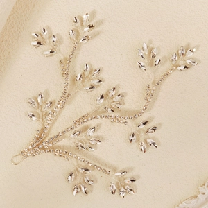 Sparkling bridal hair vine with silver branch design and clear crystals for weddings