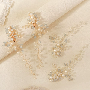 Elegant 4-piece bridal hair clip set with pearls and light blue crystal flower designs