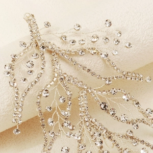 Exquisite silver bridal leaf hairpiece with sparkling crystals and handmade wired branch design