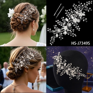 Detail of silver bridal hair vine with pearls, rhinestones and delicate leaf accents