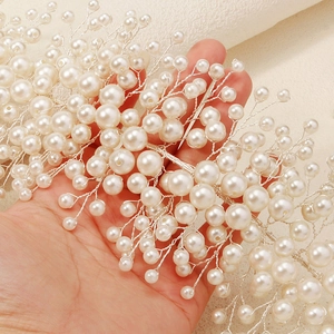 Exquisite bridal headband with handcrafted white pearls and silver wire for wedding hair