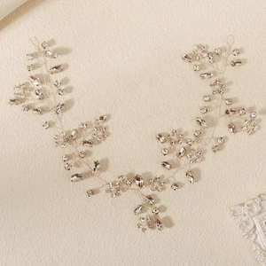 Elegant bridal hair vine with sparkling crystals and pearls on silver wire base