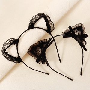 Set of two black lace cat ear headbands with delicate floral patterns and satin bows