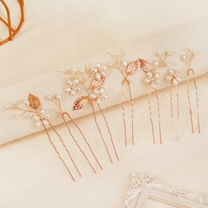7-piece handmade bridal hair pin set with rose gold leaves and white faux pearls