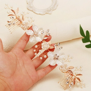 Exquisite bridal hair comb with acrylic flowers, pearls, and golden leaves for weddings