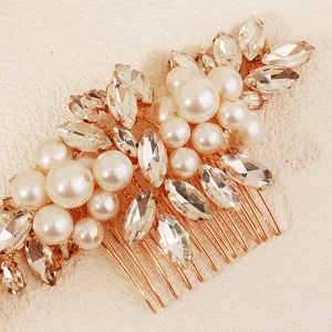 Elegant bridal hair comb with pearls and rhinestones on a rose gold wire base
