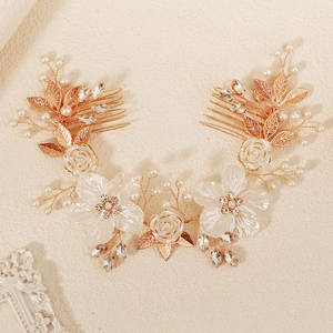 Elegant bridal hair comb with acrylic flowers, pearls and rhinestones on gold wire