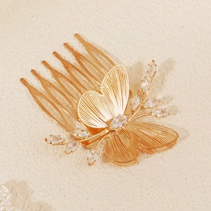 Elegant gold butterfly hair comb with sparkling zircon stones for bridal wedding hairstyles