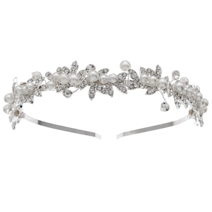 Elegant bridal headpiece with pearls and crystal leaf designs on silver-toned metal band